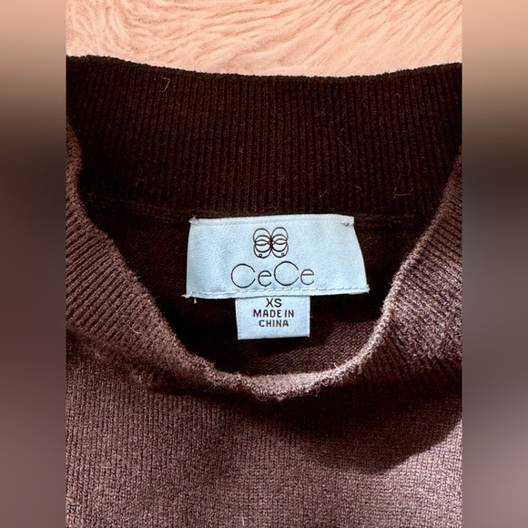 CeCe Black Mockneck Sweater with Sheer Dotted Sleeves - Picture 8 of 9